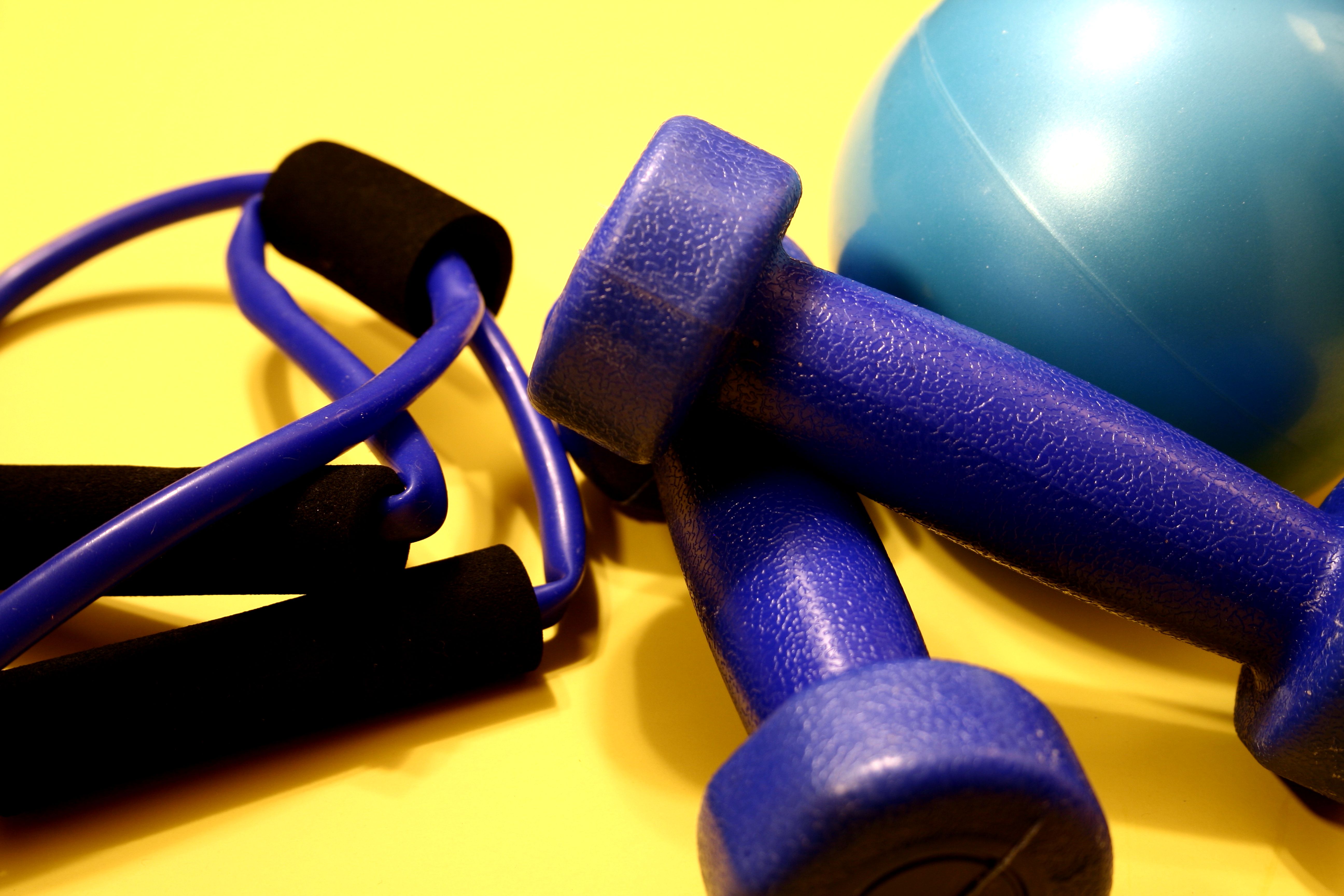 exercise-equipment-including-a-turquoise-rubber-ball